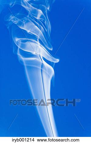 Picture - White smoke on blue background. Fotosearch