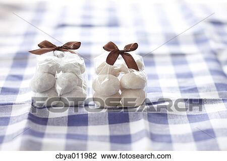 Wrapped pastry on a table View Large Photo Image Stock Image - Wrapped pastry on a table. Fotosearch