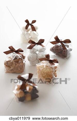 Wrapped pastry on a table View Large Photo Image Stock Photo - Wrapped pastry on a table. Fotosearch