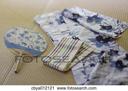 Yukata and paper fan on Tatami floor View Large Photo Image Stock Image - Yukata and paper fan on Tatami floor. Fotosearch