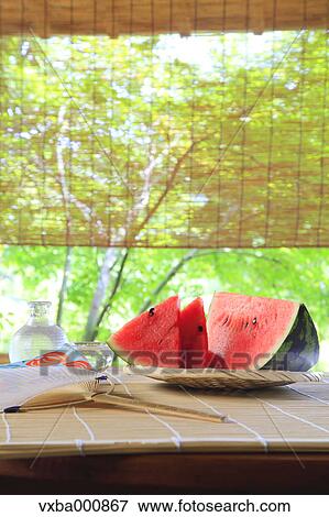 Bamboo blind and watermelon View Large Photo Image Stock Photo - Bamboo blind and watermelon. Fotosearch