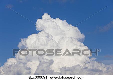 Stock Image - Blue sky and clouds. Fotosearch