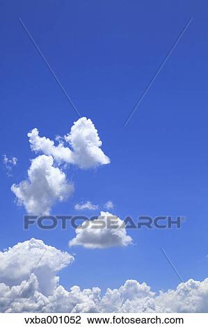 Blue sky and clouds View Large Photo Image Stock Image - Blue sky and clouds. Fotosearch