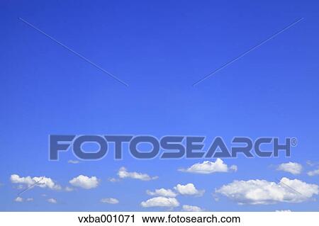 Blue sky and clouds View Large Photo Image Stock Image - Blue sky and clouds. Fotosearch