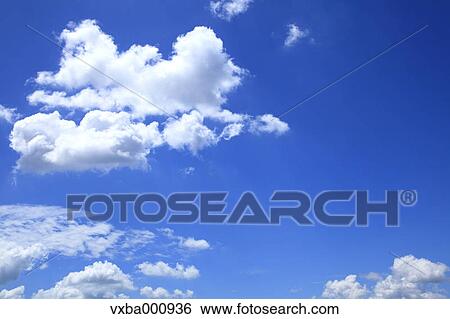 Blue sky and clouds View Large Photo Image Stock Photograph - Blue sky and clouds. Fotosearch