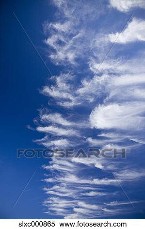 Blue sky and clouds View Large Photo Image Stock Photography - Blue sky and clouds. Fotosearch