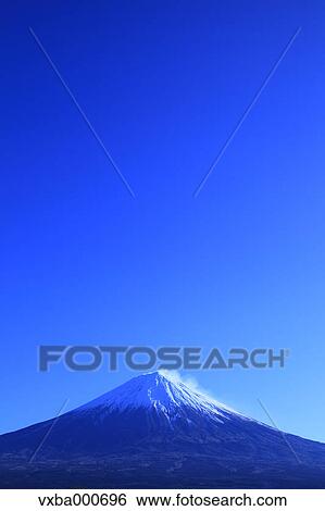 Stock Photograph - Blue sky and Mount Fuji, Shizuoka Prefecture. Fotosearch