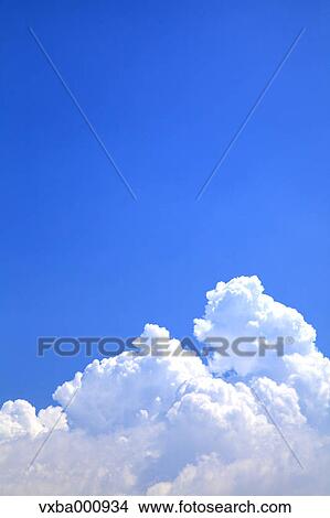 Blue sky with clouds View Large Photo Image Picture - Blue sky with clouds. Fotosearch