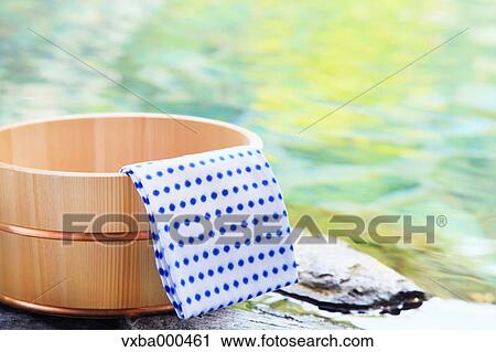 Cloth and tub at open-air hot springs View Large Photo Image Stock Image - Cloth and tub at open-air hot springs. Fotosearch