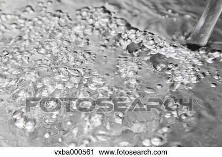 Stock Image - Flowing water. Fotosearch