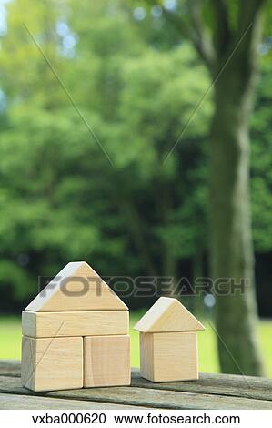 Stock Image - Houses made of building blocks. Fotosearch