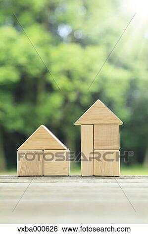 Stock Photograph - Houses made of building blocks. Fotosearch
