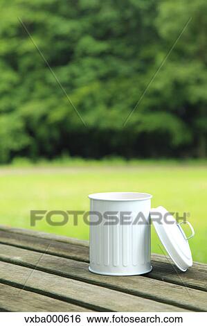 Stock Photograph - Miniature trash can. Fotosearch