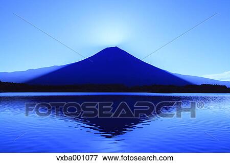 Stock Photo - Mount Fuji and Lake Tanuki before dawn, Shizuoka Prefecture. Fotosearch