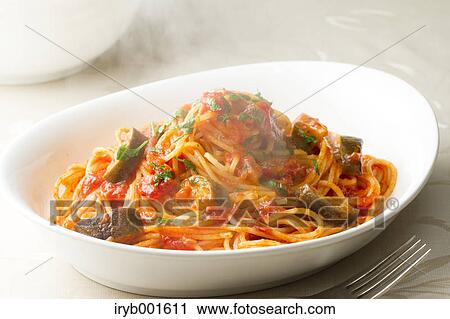 Spaghetti with tomato sauce and eggplant View Large Photo Image Stock Image - Spaghetti with tomato sauce and eggplant. Fotosearch