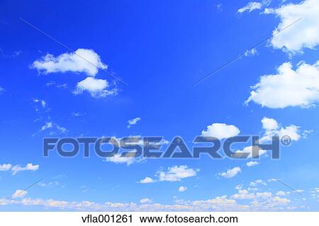 Blue sky with clouds View Large Photo Image Stock Image - Blue sky with clouds. Fotosearch