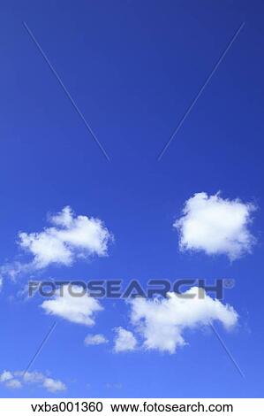 Blue sky with clouds View Large Photo Image Stock Image - Blue sky with clouds. Fotosearch