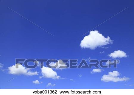 Blue sky with clouds View Large Photo Image Stock Image - Blue sky with clouds. Fotosearch