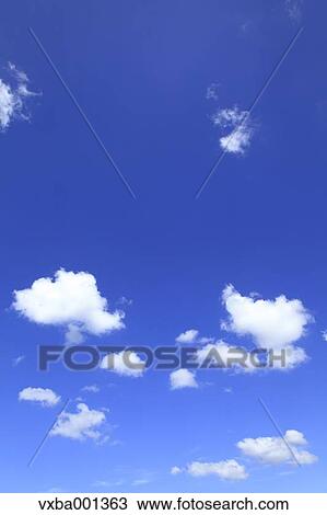 Blue sky with clouds View Large Photo Image Stock Image - Blue sky with clouds. Fotosearch
