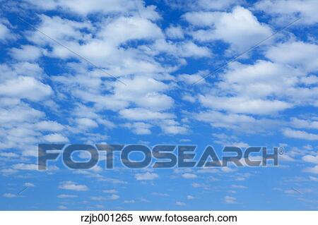 Blue sky with clouds View Large Photo Image Stock Photography - Blue sky with clouds. Fotosearch