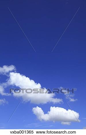 Blue sky with clouds View Large Photo Image Stock Photography - Blue sky with clouds. Fotosearch