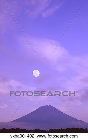 Stock Image - Full moon and Mount Fuji, Yamanashi Prefecture. Fotosearch
