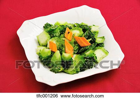 Stock Photograph - Stir-fried bitter gourd. Fotosearch