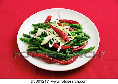 Stir-fried green peas and chilly peppers View Large Photo Image Stock Photo - Stir-fried green peas and chilly peppers. Fotosearch