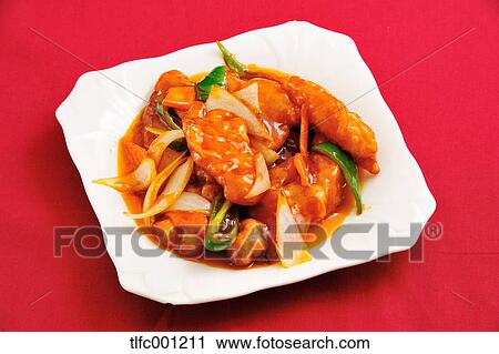 Stock Image - Stir-fried white fish and vegetables. Fotosearch