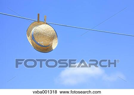 Straw hat and sky View Large Photo Image Stock Photo - Straw hat and sky. Fotosearch