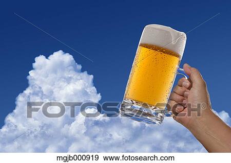 Beer and blue sky with clouds View Large Photo Image Stock Photo - Beer and blue sky with clouds. Fotosearch