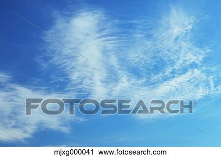 Blue sky with clouds View Large Photo Image Stock Image - Blue sky with clouds. Fotosearch