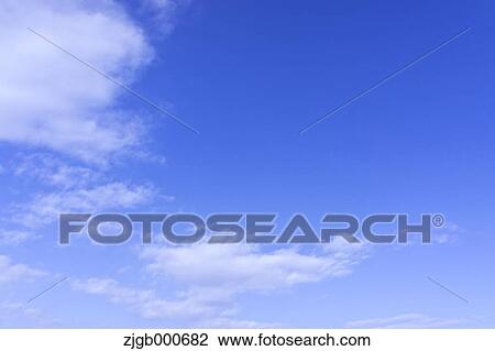 Blue sky with clouds View Large Photo Image Stock Image - Blue sky with clouds. Fotosearch