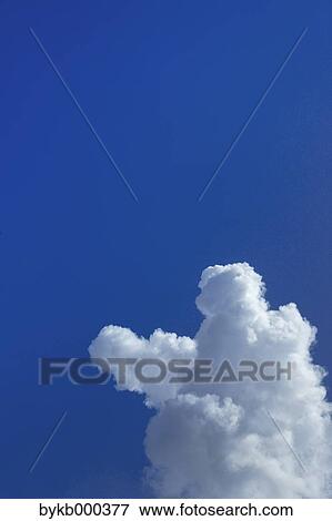 Blue sky with clouds View Large Photo Image Stock Photo - Blue sky with clouds. Fotosearch