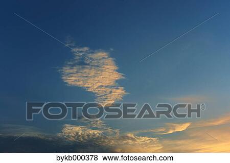 Blue sky with clouds View Large Photo Image Stock Photo - Blue sky with clouds. Fotosearch