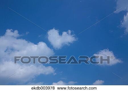 Stock Photo - Blue sky with clouds. Fotosearch