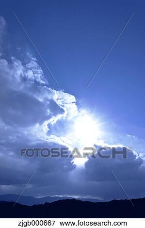 Stock Photo - Blue sky with clouds. Fotosearch