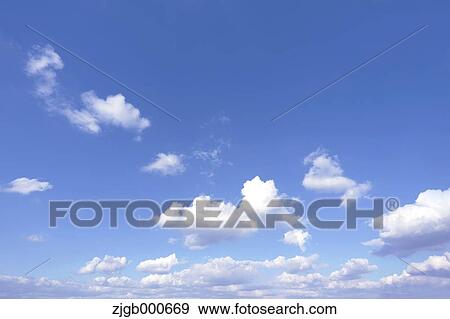 Blue sky with clouds View Large Photo Image Stock Photo - Blue sky with clouds. Fotosearch