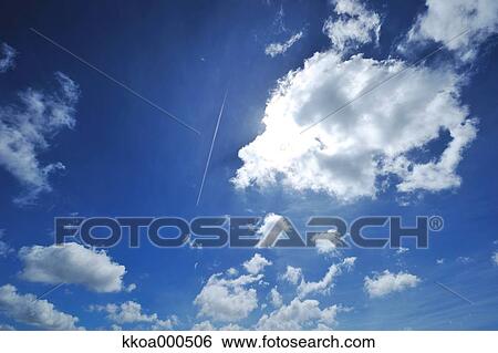 Stock Photograph - Blue sky with clouds. Fotosearch