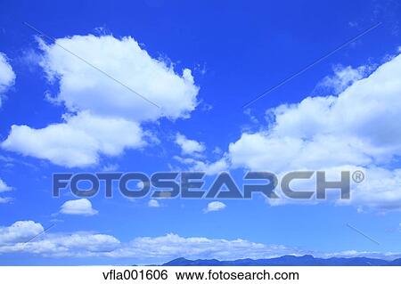 Blue sky with clouds View Large Photo Image Stock Photograph - Blue sky with clouds. Fotosearch