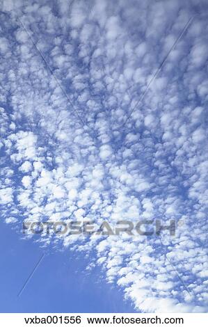 Stock Photograph - Blue sky with clouds. Fotosearch