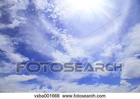 Blue sky with clouds View Large Photo Image Stock Photograph - Blue sky with clouds. Fotosearch