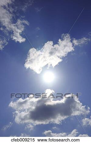 Blue sky with clouds View Large Photo Image Stock Photography - Blue sky with clouds. Fotosearch