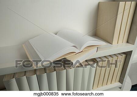 Book on white bookshelf View Large Photo Image Stock Photography - Book on white bookshelf. Fotosearch
