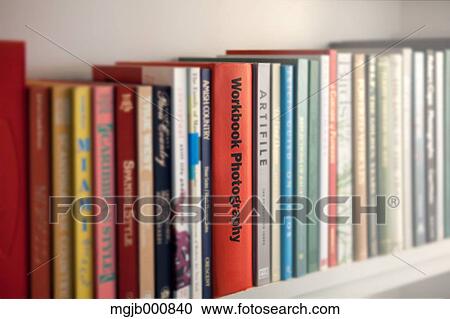 Stock Image - Books in a line. Fotosearch