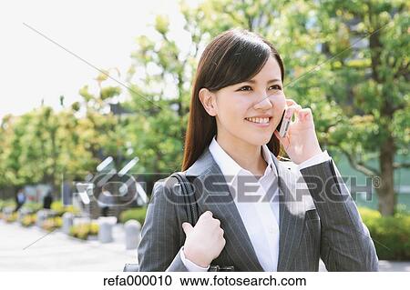 Businesswoman on the phone View Large Photo Image Stock Image - Businesswoman on the phone. Fotosearch