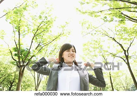 Businesswoman stretching arms View Large Photo Image Stock Image - Businesswoman stretching arms. Fotosearch