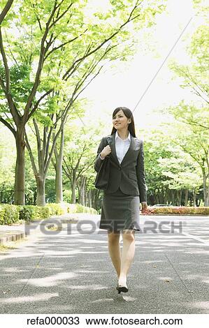 Businesswoman walking View Large Photo Image Stock Image - Businesswoman walking. Fotosearch