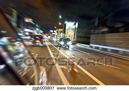 Stock Photo - Car travelling at night. Fotosearch