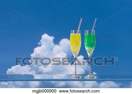 Cocktails and blue sky with clouds View Large Photo Image Stock Image - Cocktails and blue sky with clouds. Fotosearch